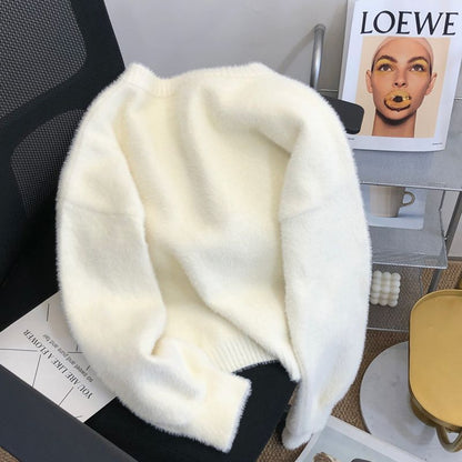 Cardigan Doux à Boutons Perlés – Élégance et Confort d’Hiver